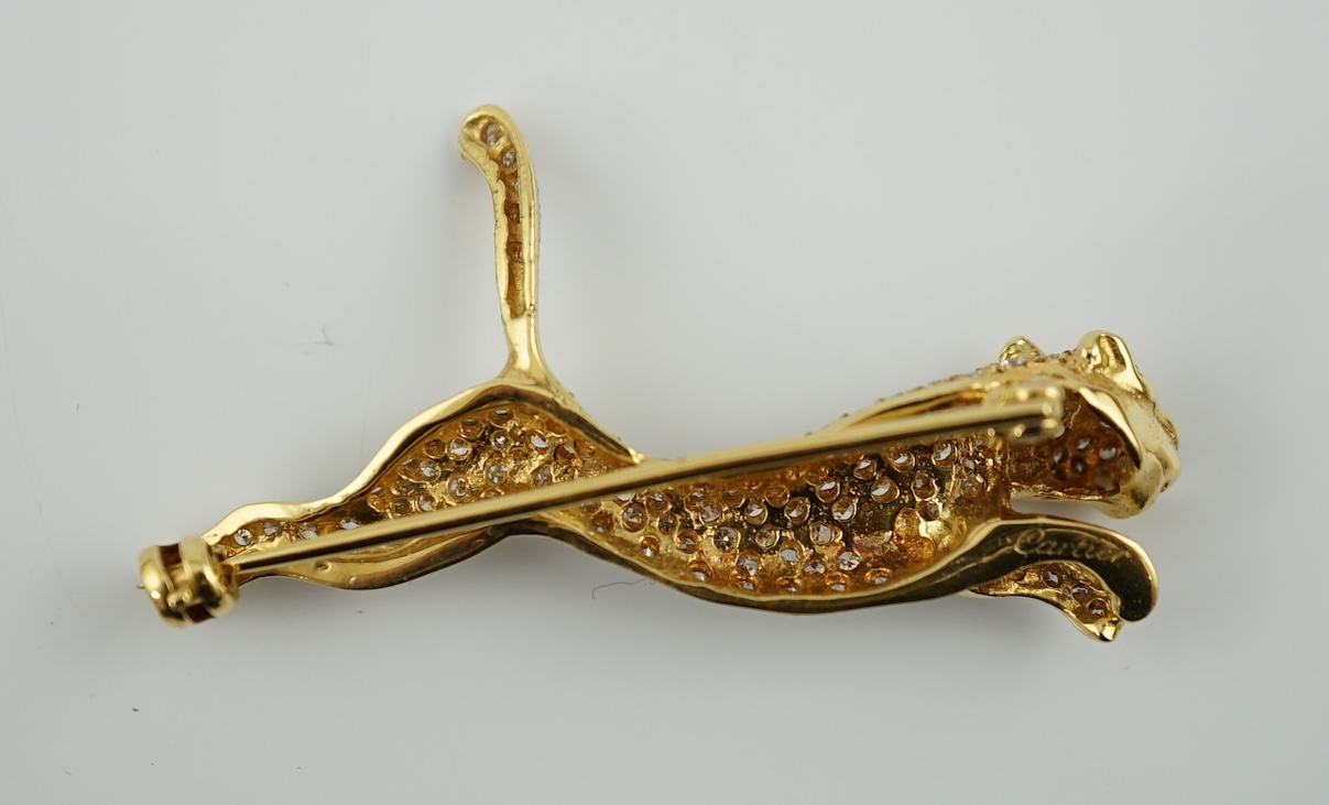 A gold and pave set diamond leaping panther brooch
